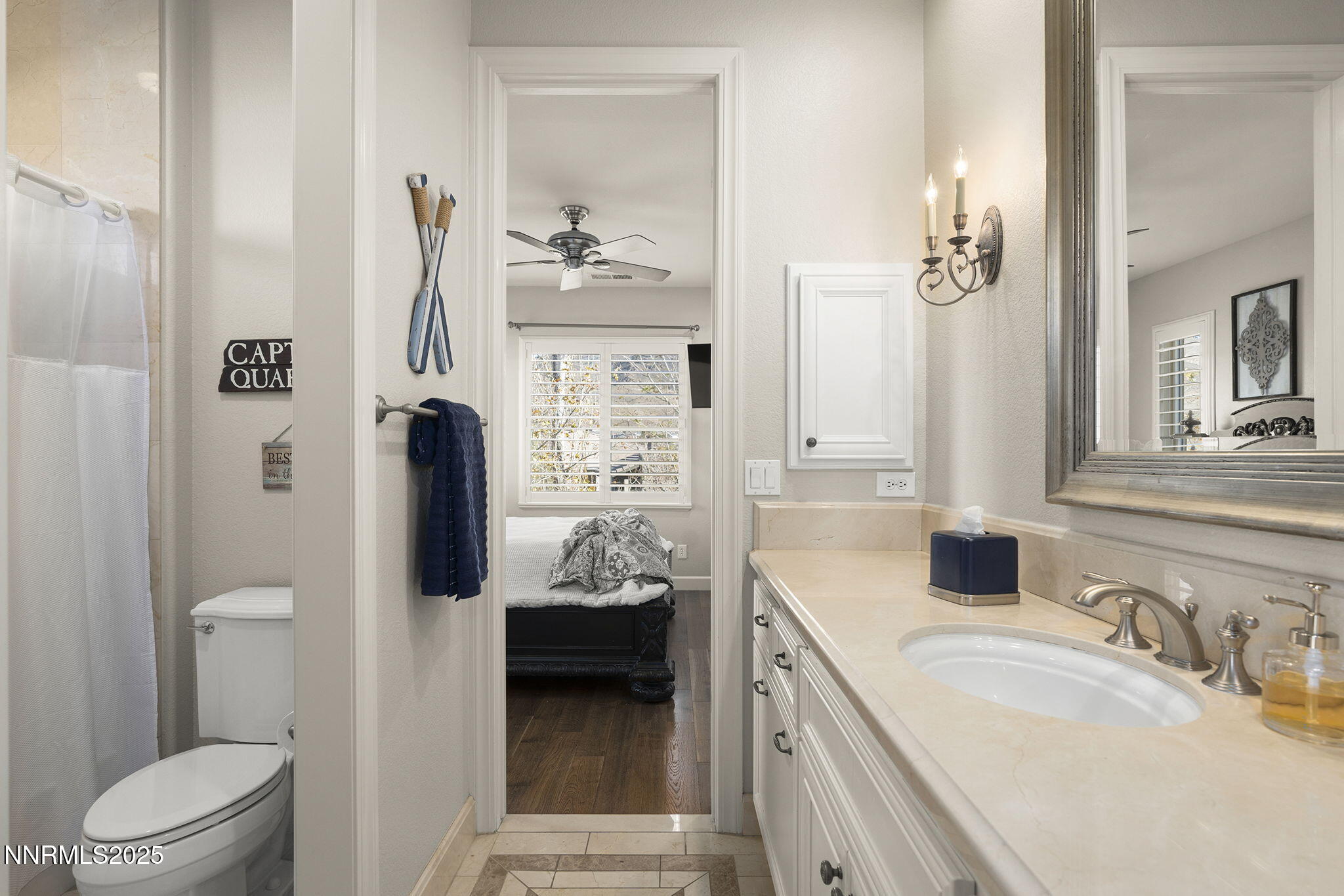 9890 Kerrydale Court Reno, NV 89521 - Photo 35 of 48 a bathroom with a sink a toilet and shower