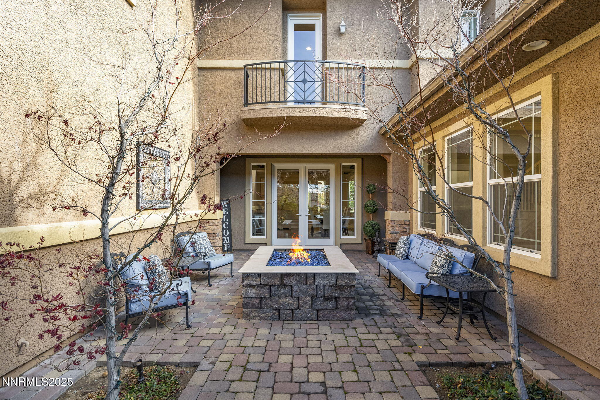 9890 Kerrydale Court Reno, NV 89521 - Photo 45 of 48 a front view of a building with sitting area