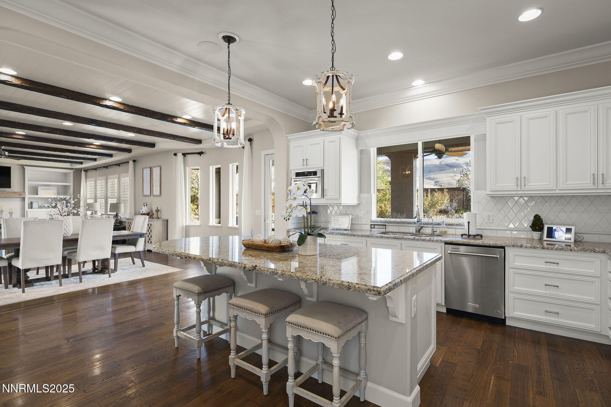 9890 Kerrydale Court Reno, NV 89521 - Photo 8 of 48 a large kitchen with lots of counter space and chandelier