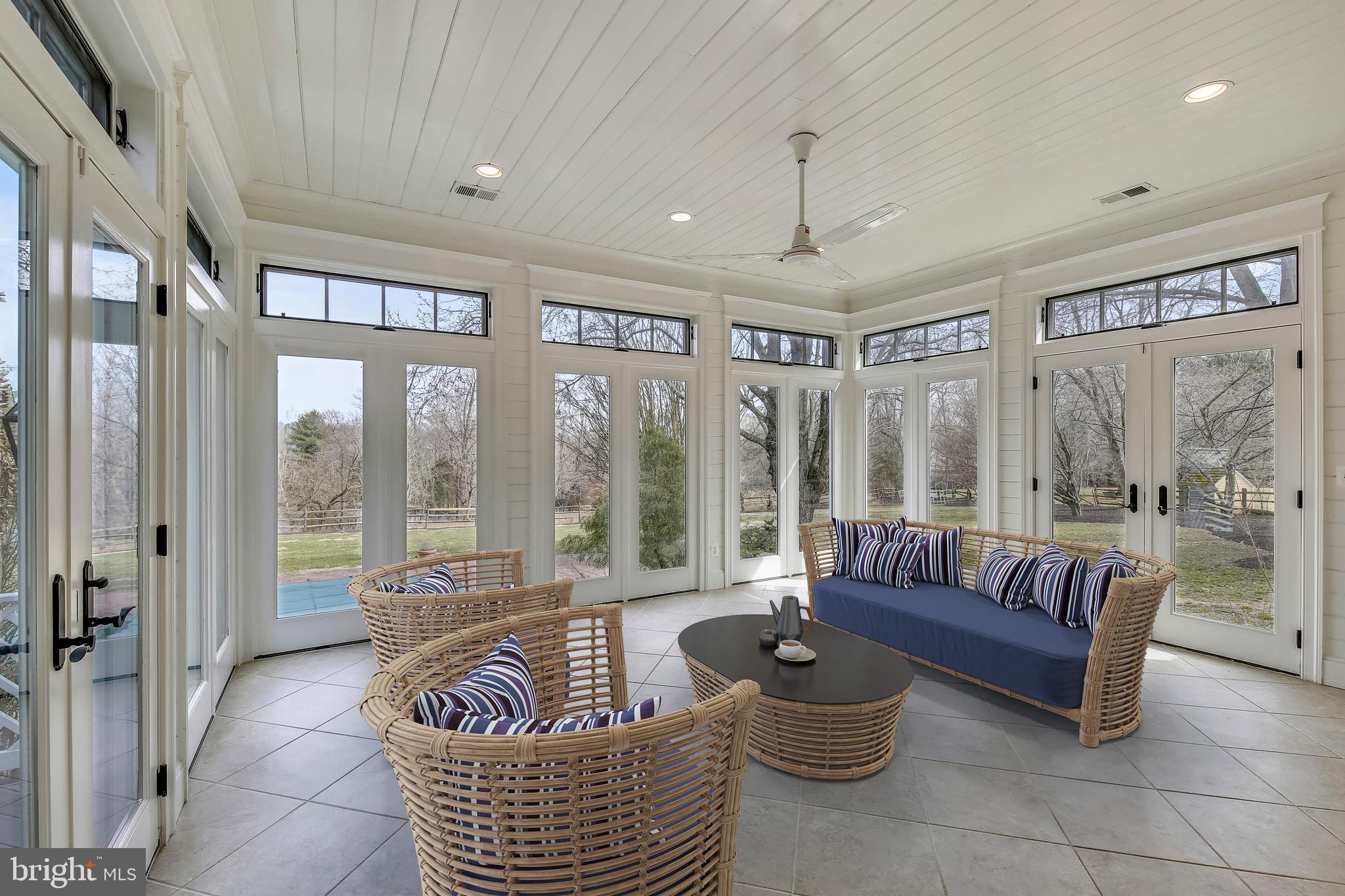 5 Beall Spring Court Potomac, MD 20854 - Photo 14 of 57 Sunroom with virtual staging