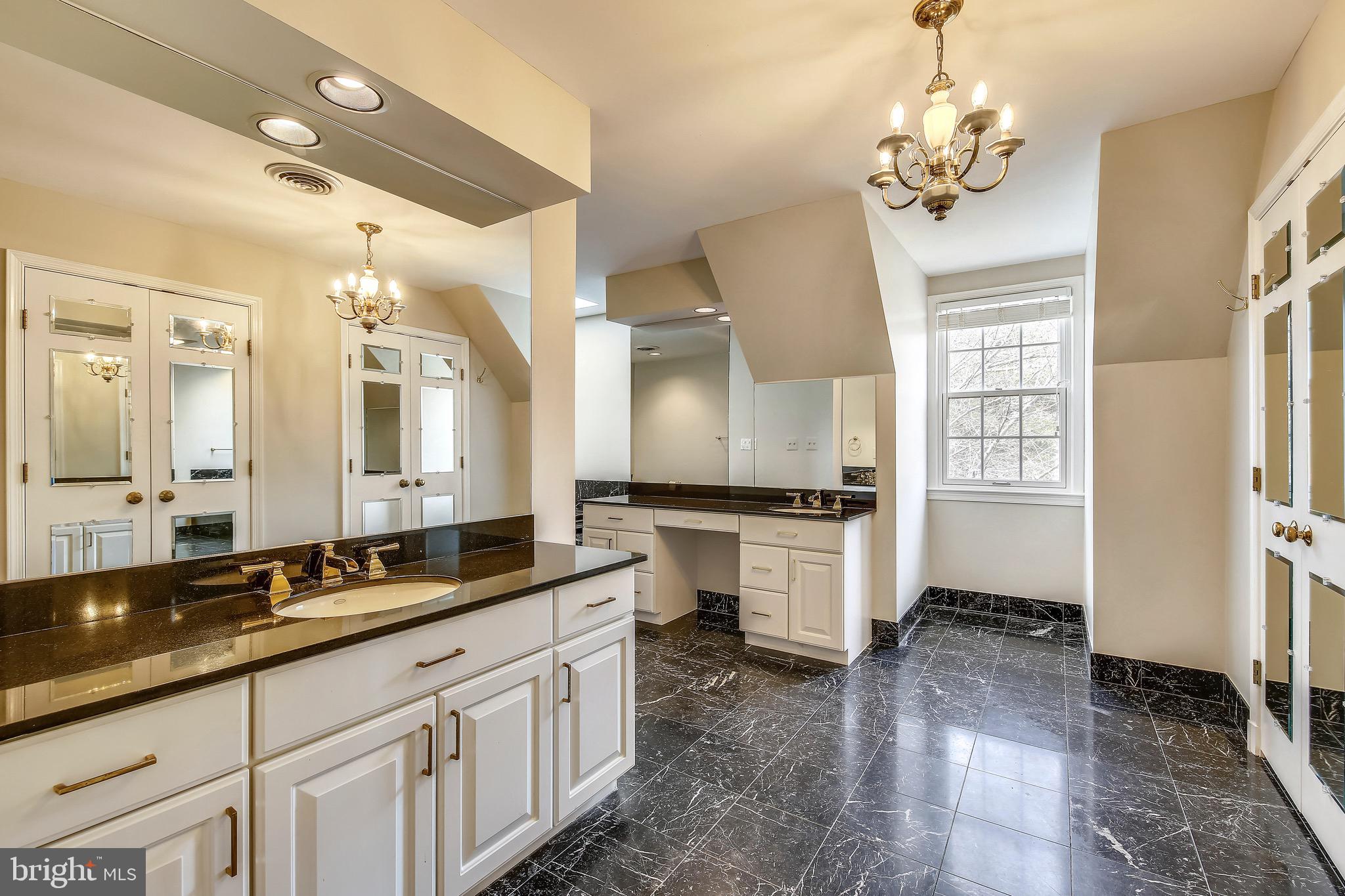 5 Beall Spring Court Potomac, MD 20854 - Photo 22 of 57 Master Bath w Sep Vanities, Tub + Shower, Skylight