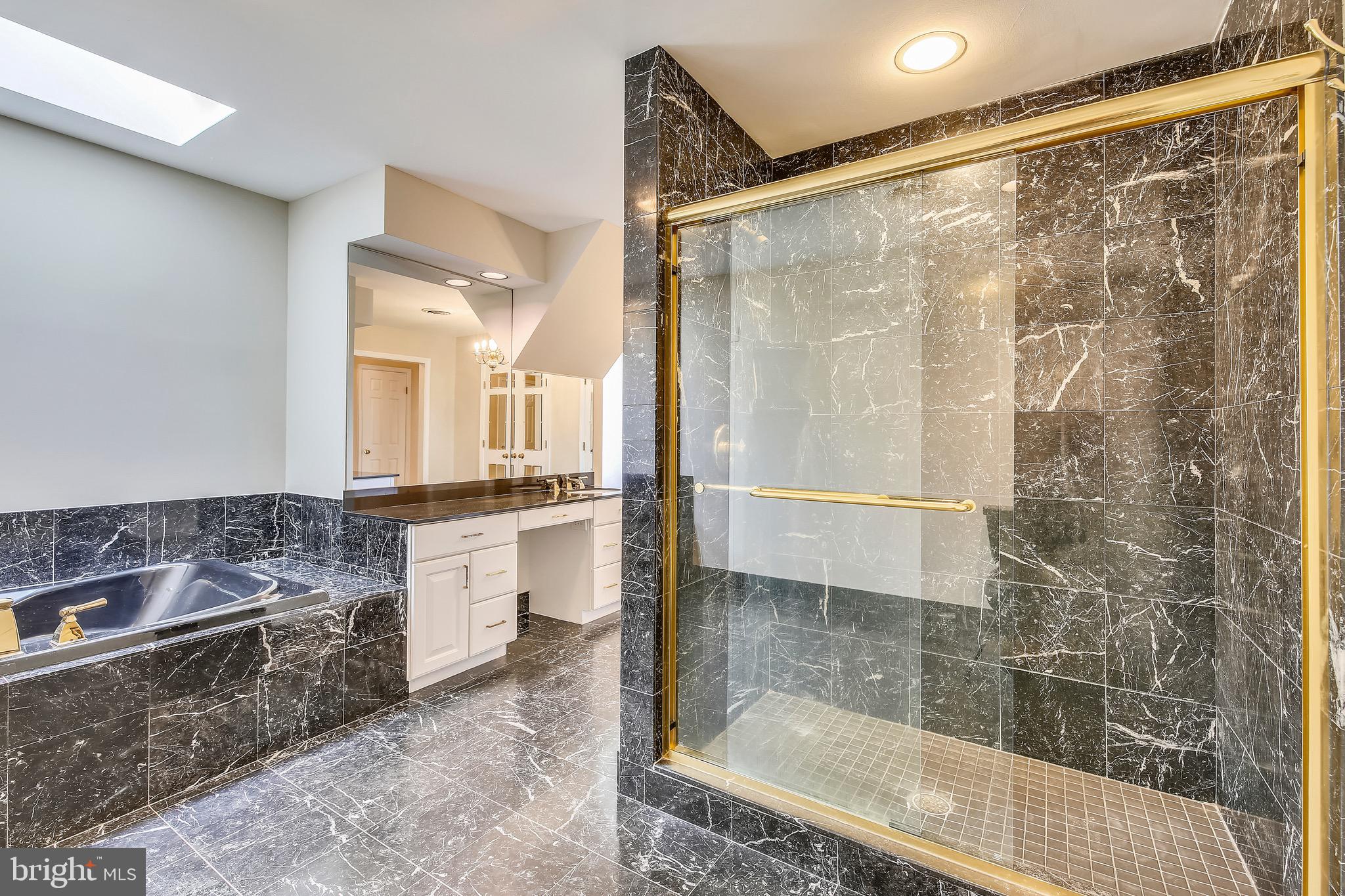 5 Beall Spring Court Potomac, MD 20854 - Photo 23 of 57 Master Bath w Sep Vanities, Tub + Shower, Skylight