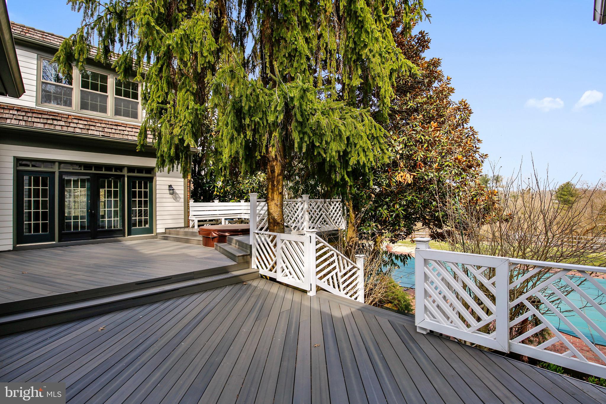 5 Beall Spring Court Potomac, MD 20854 - Photo 37 of 57 Rear Deck Overlooking Pond