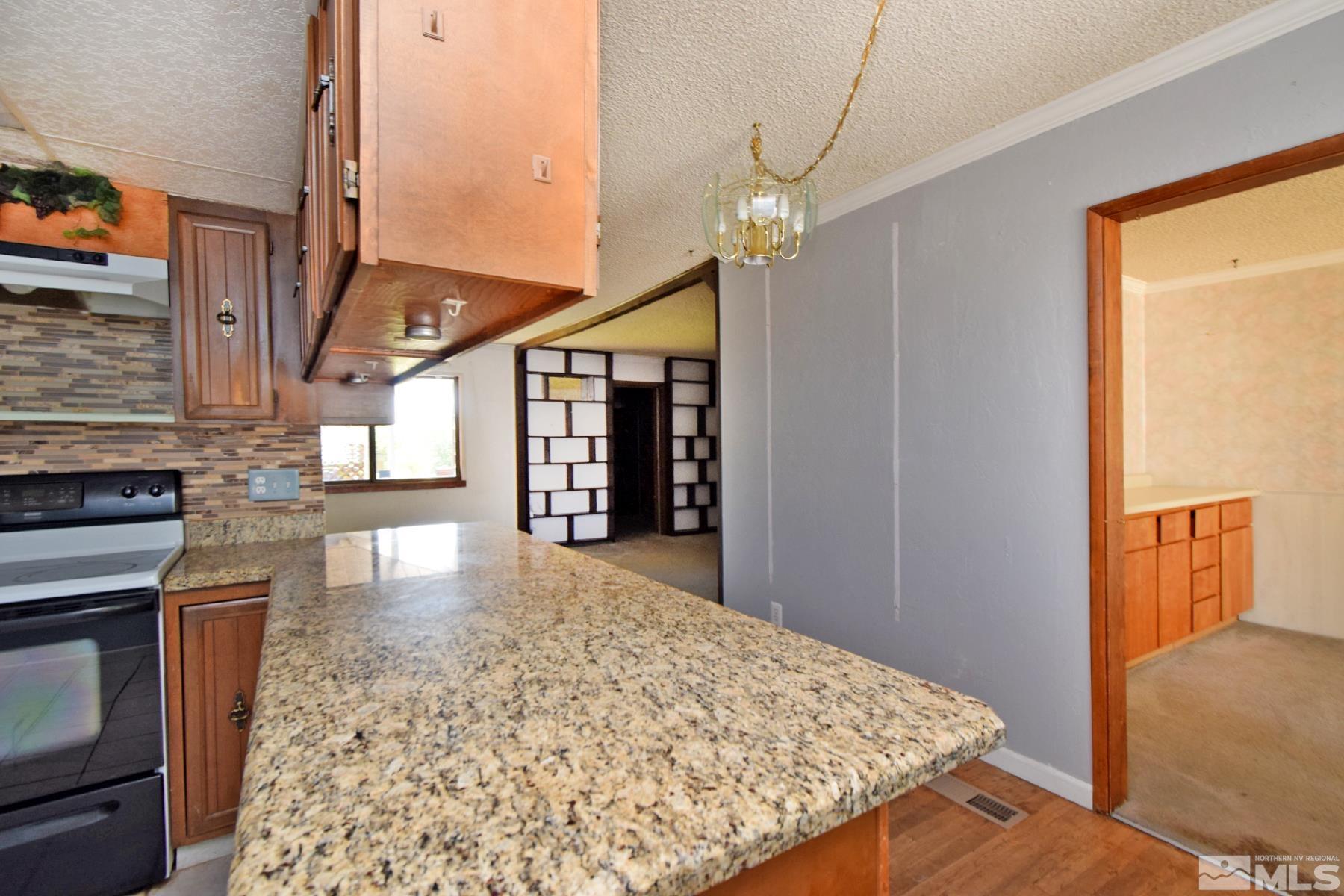 1279 Ebbetts Drive Reno, NV 89503 - Photo 13 of 37 a very nice looking room with a large window