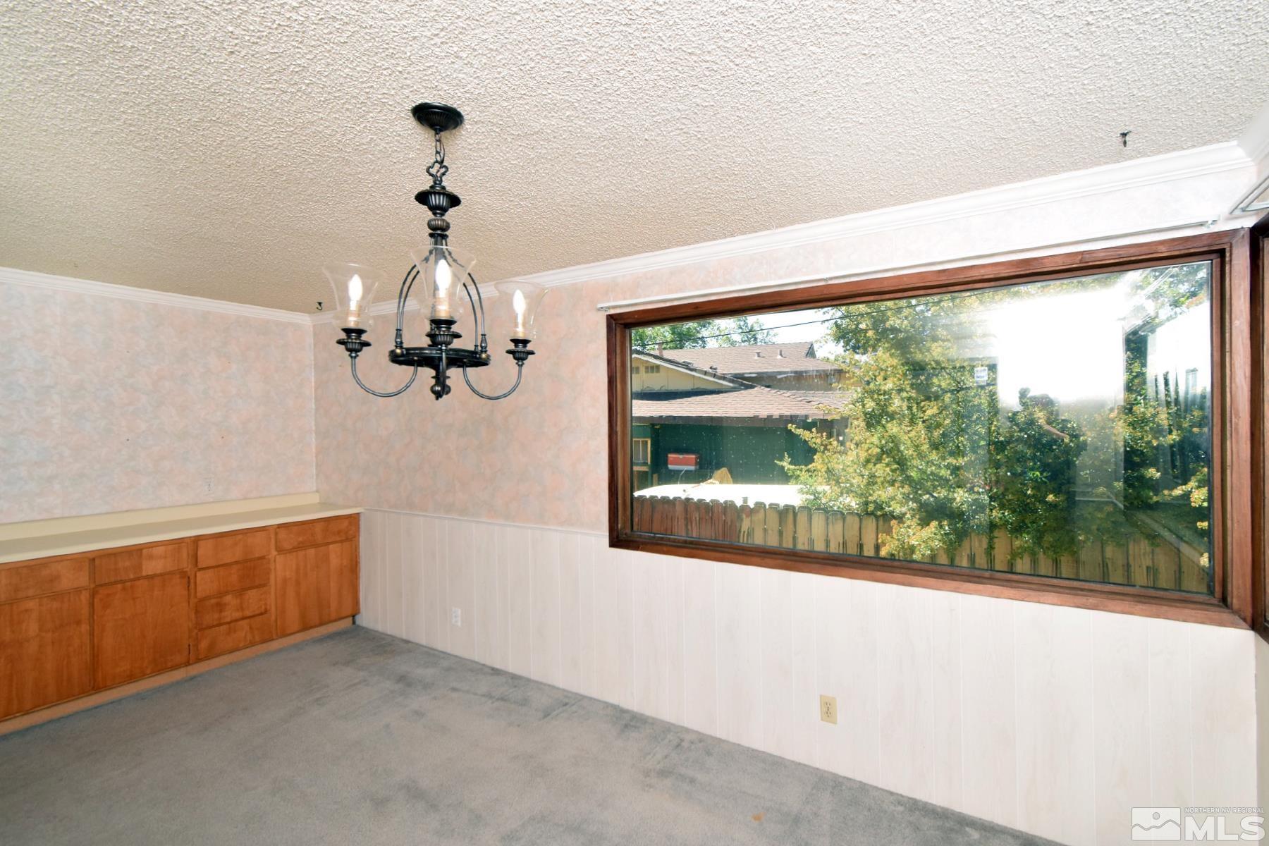 1279 Ebbetts Drive Reno, NV 89503 - Photo 17 of 37 a view of a room with a large window