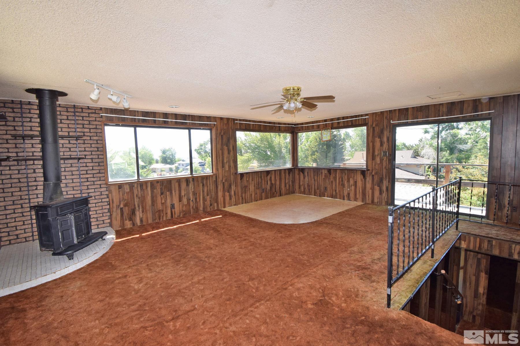 1279 Ebbetts Drive Reno, NV 89503 - Photo 30 of 37 wooden floor in an empty room with a window