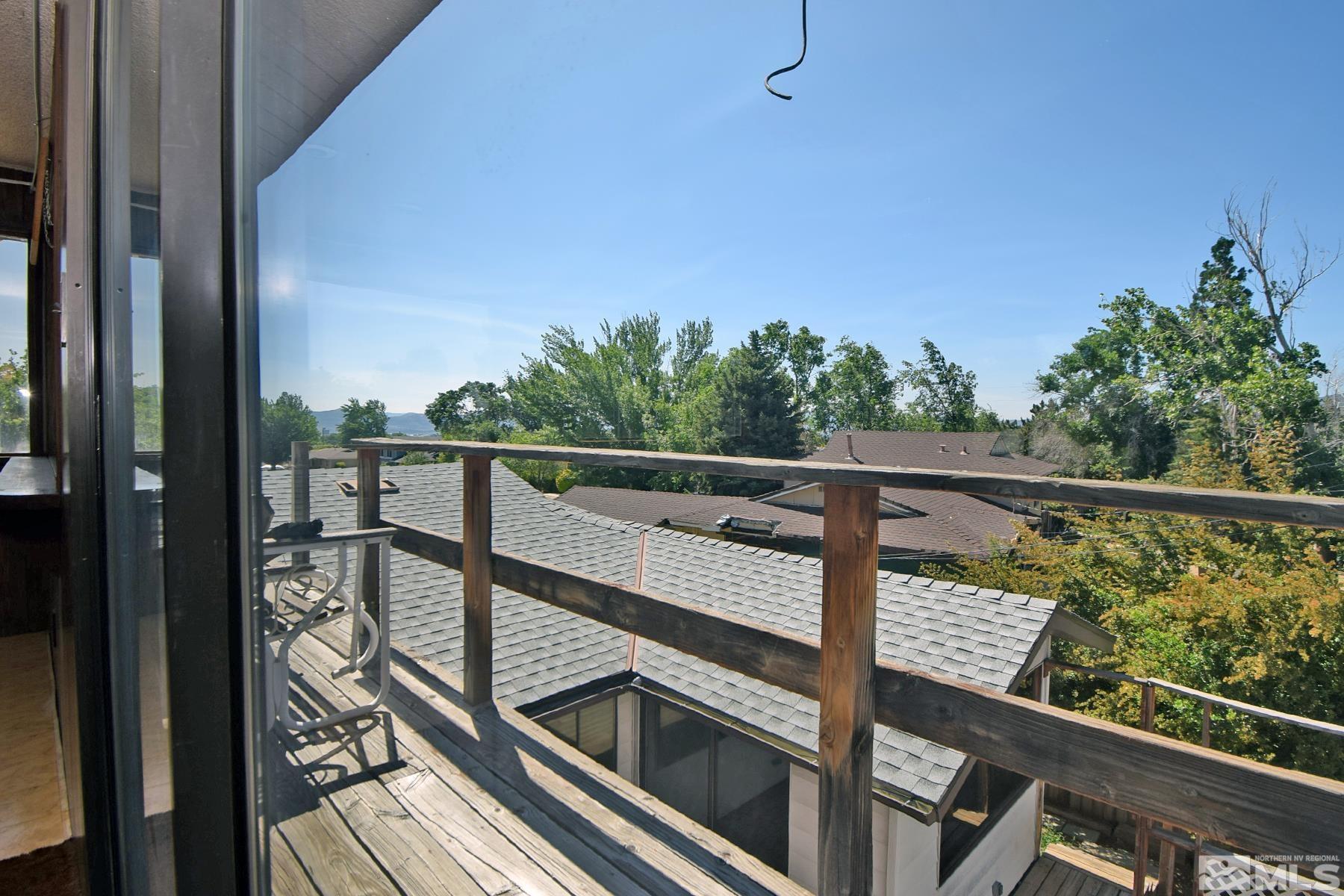 1279 Ebbetts Drive Reno, NV 89503 - Photo 34 of 37 a view of a balcony with wooden floor