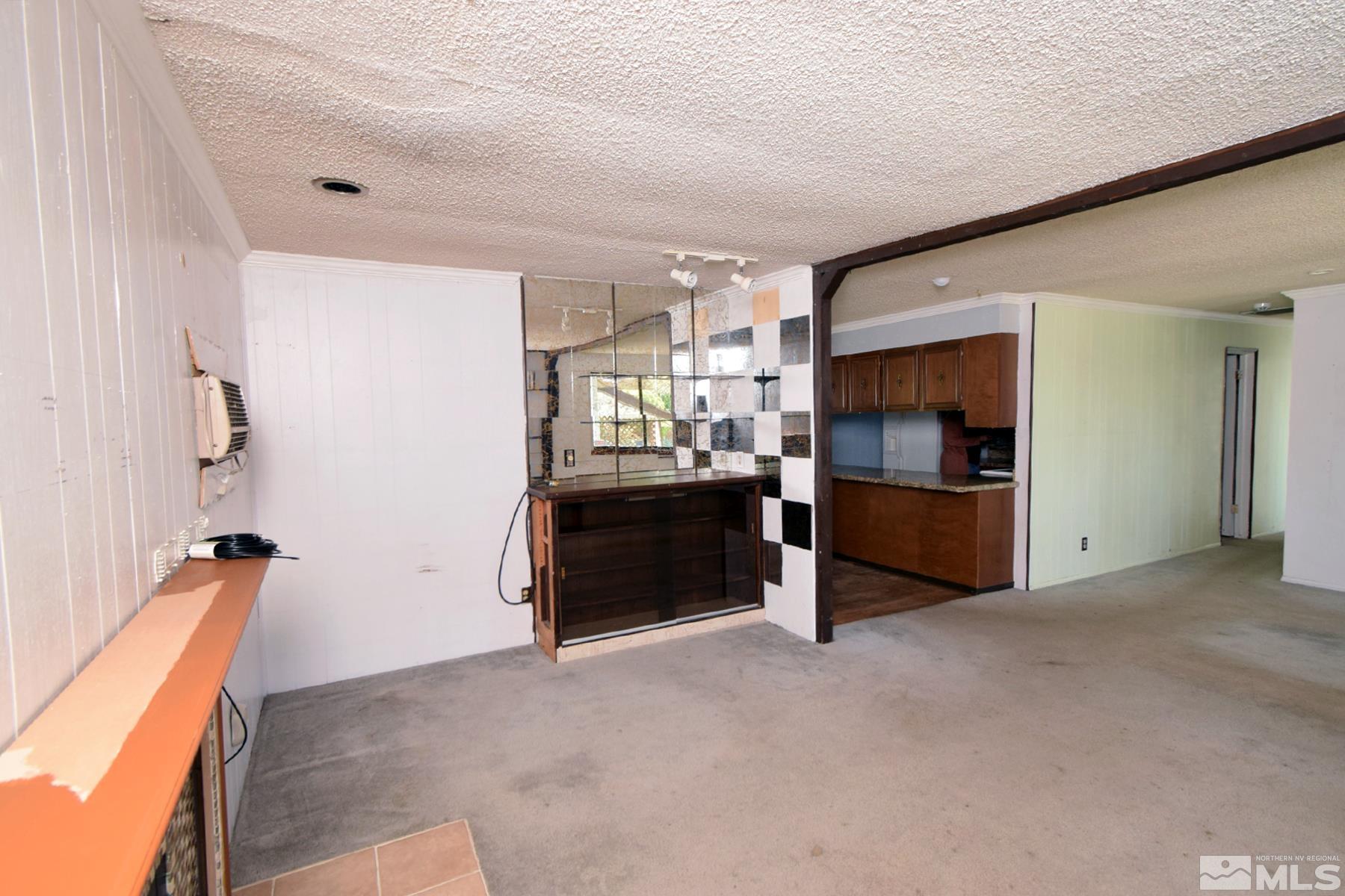 1279 Ebbetts Drive Reno, NV 89503 - Photo 8 of 37 a view of kitchen and refrigerator