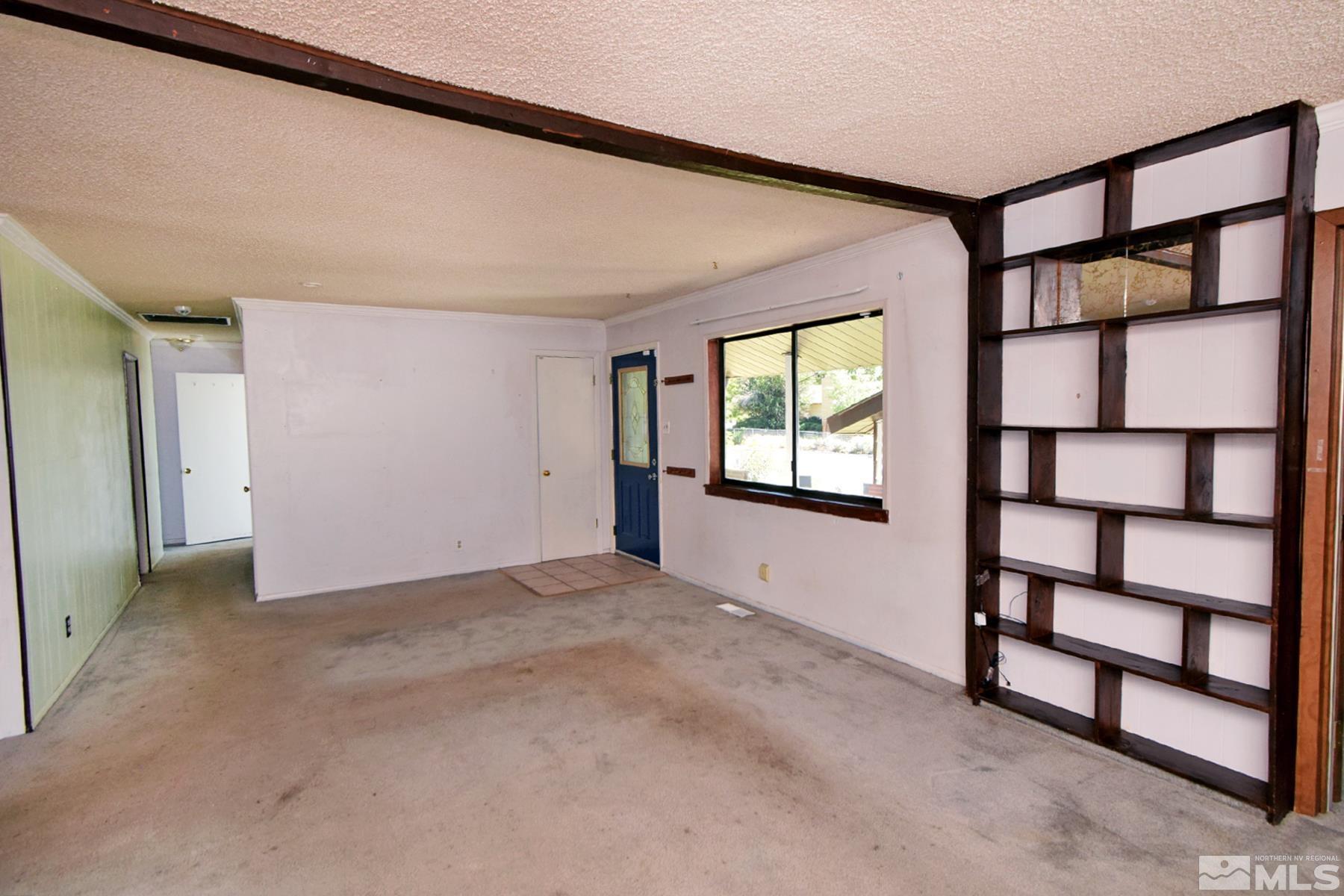 1279 Ebbetts Drive Reno, NV 89503 - Photo 9 of 37 a view of an empty room with a window