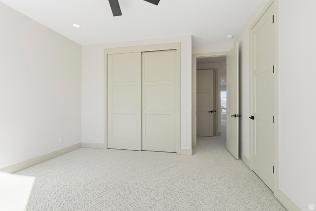 226 East 1100 North Hurricane, UT 84737 - Photo 35 of 49 Unfurnished bedroom with light carpet, a closet, a ceiling fan, and recessed lighting