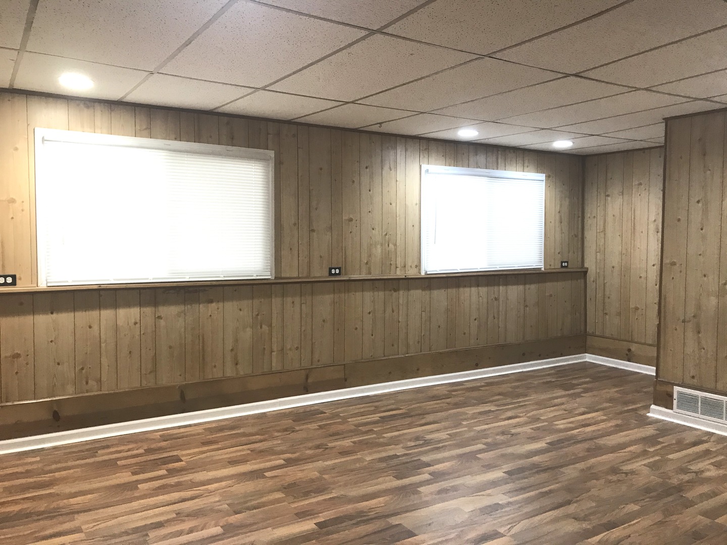 309 Rockhurst Road Bolingbrook, IL 60440 - Photo 13 of 17 an empty room with wooden floor and windows