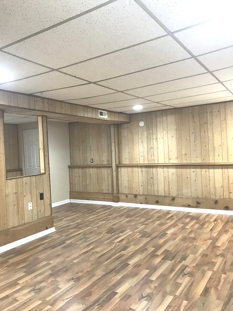 309 Rockhurst Road Bolingbrook, IL 60440 - Photo 14 of 17 a view of an empty room with a window