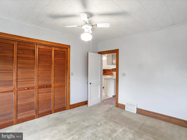 an empty room with closet