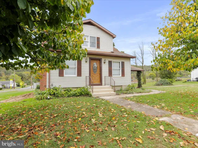 a house view with a garden space