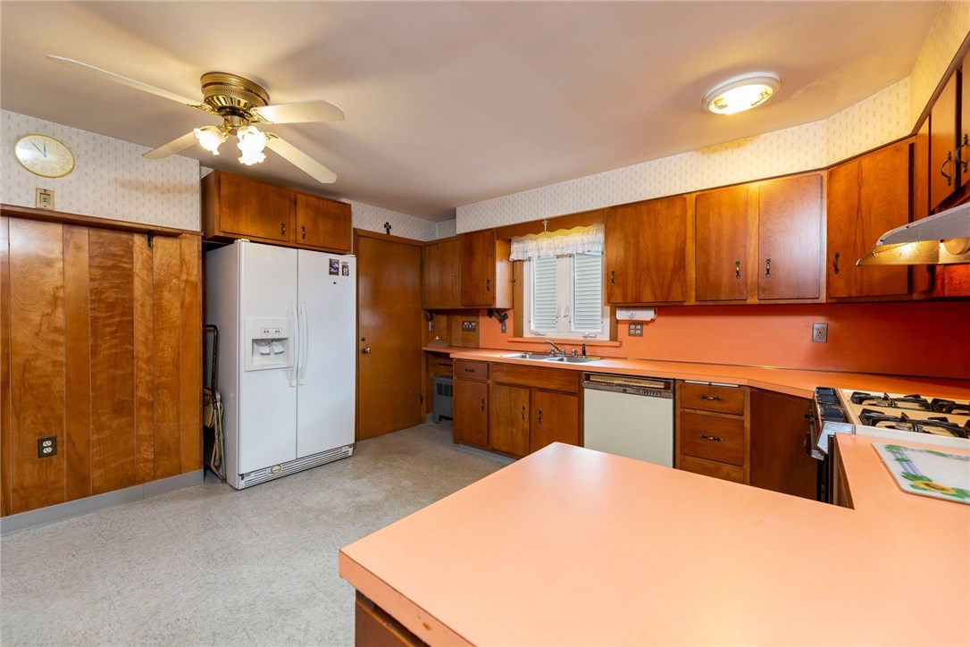 13 Tweed Street Pawtucket, RI 02861 - Photo 8 of 27 View looking into the kitchen from the hallway