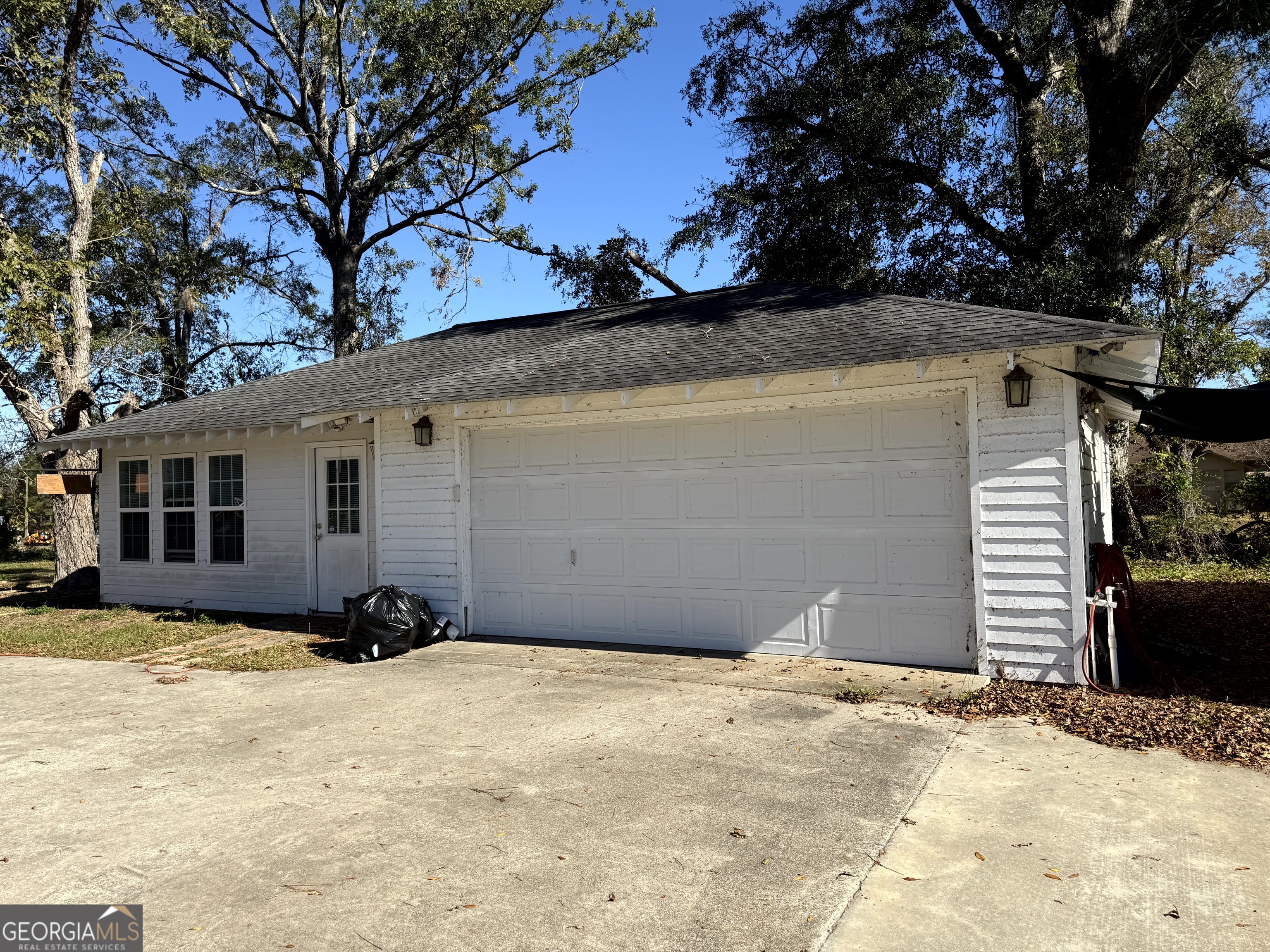 4980 West Broad Street Alston, GA 30410 - Photo 5 of 6 a view of a backyard of the house