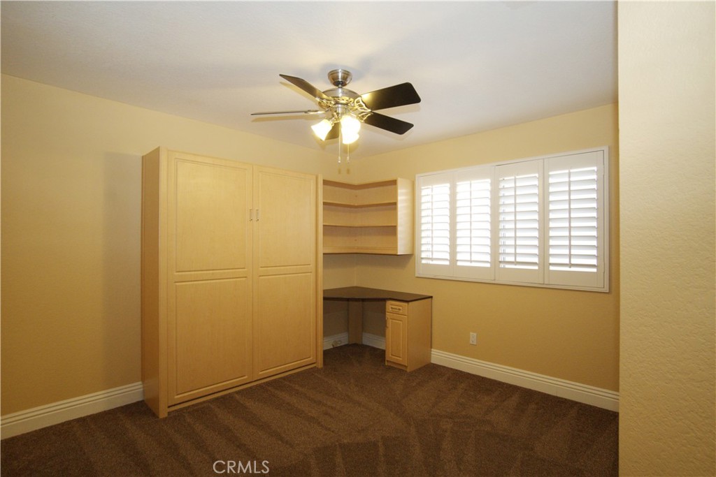 7135 Highland Spring Lane Highland, CA 92346 - Photo 26 of 72 Main floor bedroom with a murphy bed