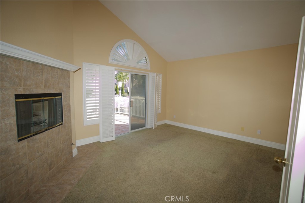7135 Highland Spring Lane Highland, CA 92346 - Photo 46 of 72 Primary bedroom with double sided fire place