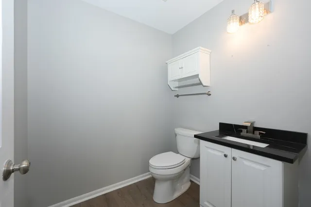 a bathroom with a toilet and a sink