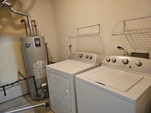 a utility room with dryer and washer