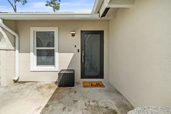 a view of an entryway with a window
