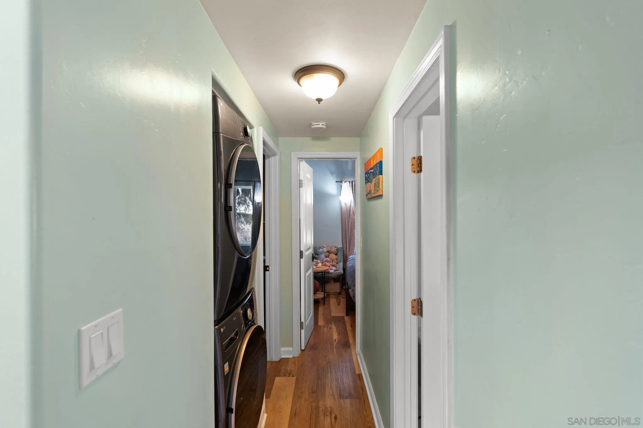 4722 Park Lane Alpine, CA 91901 - Photo 12 of 35 a view of hallway with stairs and wooden floor