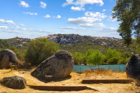 a view of a lake with a mountain in the background