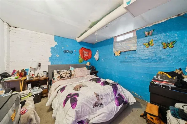 a bedroom with a bed and a bed
