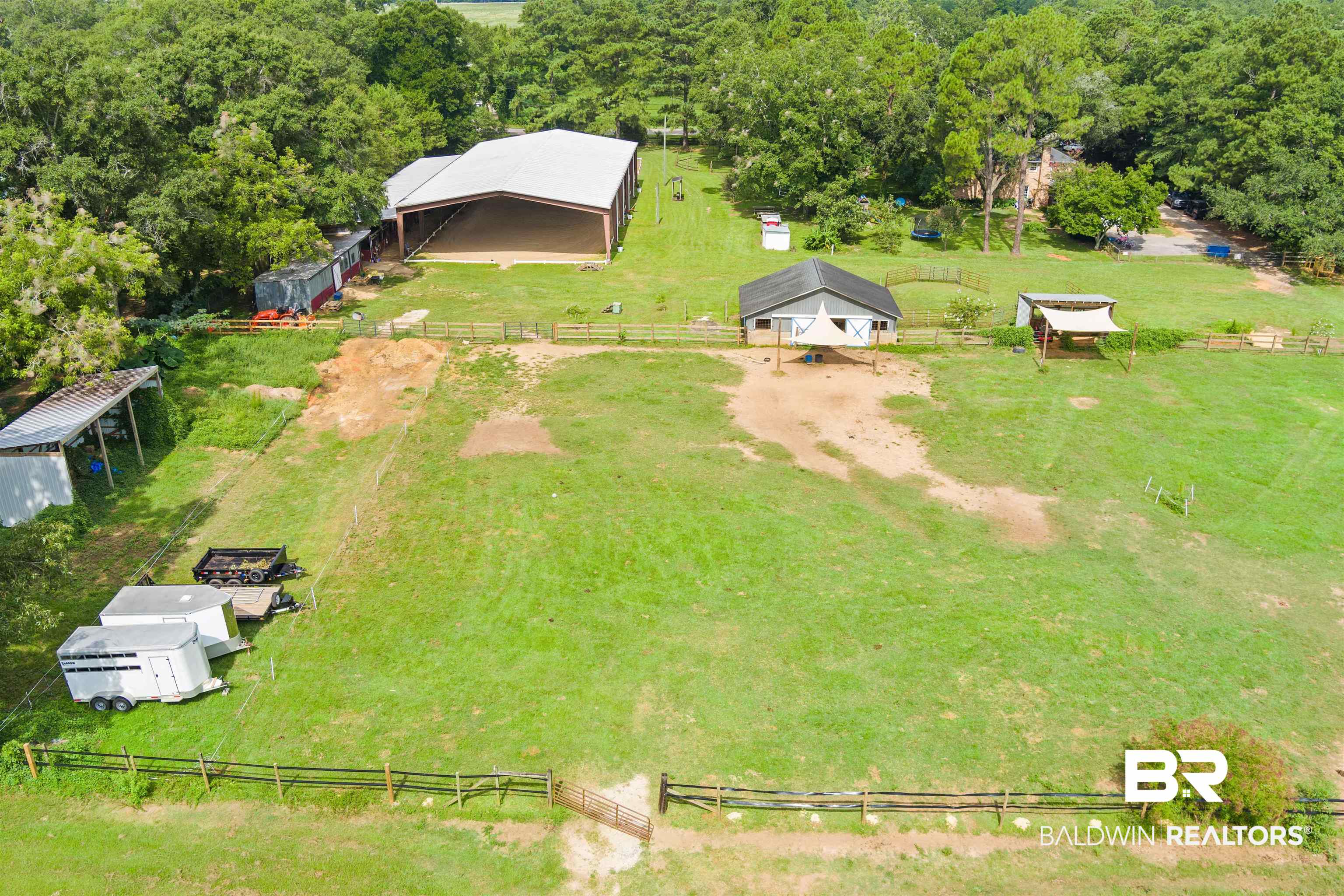 700 Eliza Jordan Road North Mobile, AL 36608 - Photo 38 of 44 View of rural area with a pastoral area and a heavily wooded area