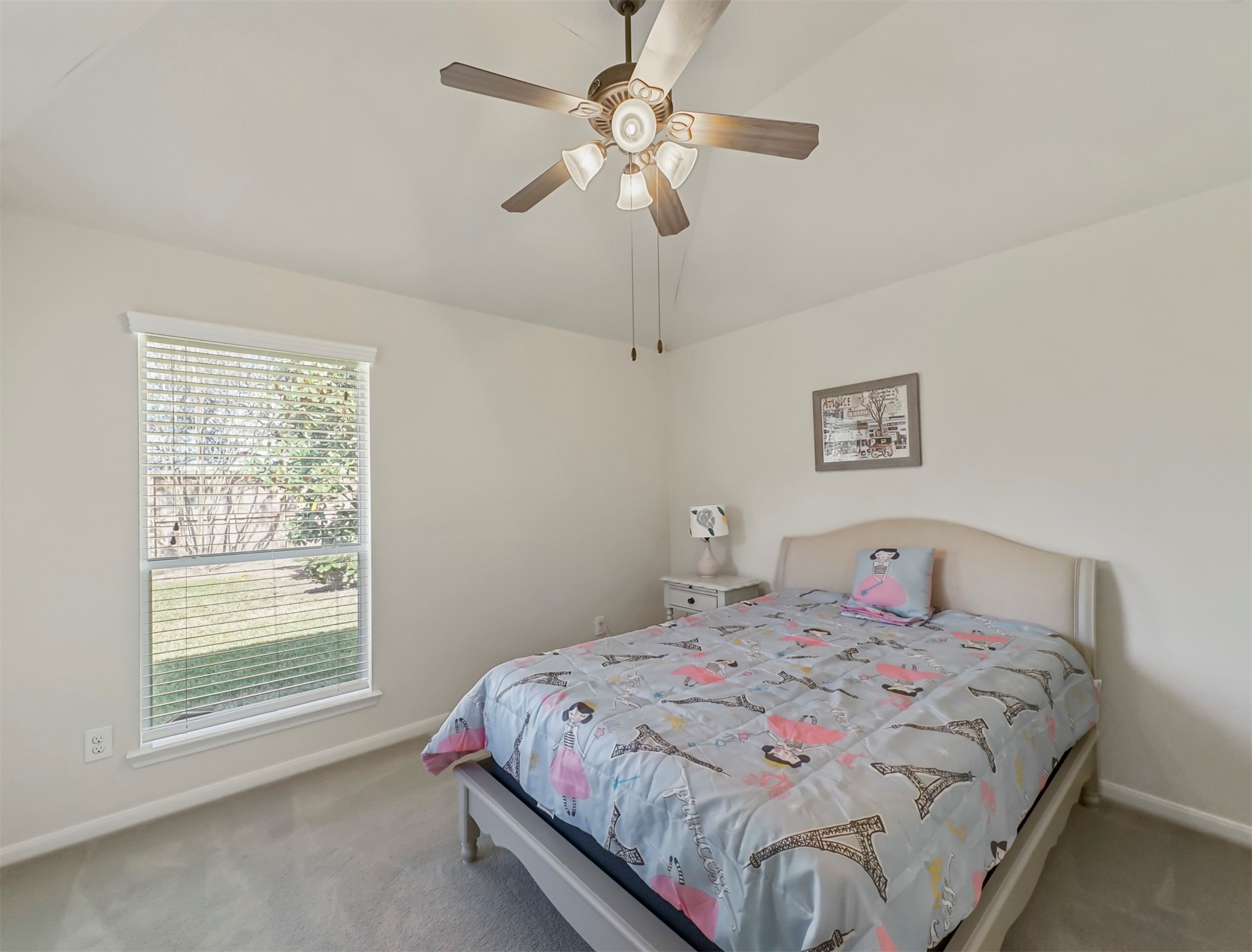 8214 Garrison Point Drive Houston, TX 77040 - Photo 15 of 37 a bedroom with a bed and a window