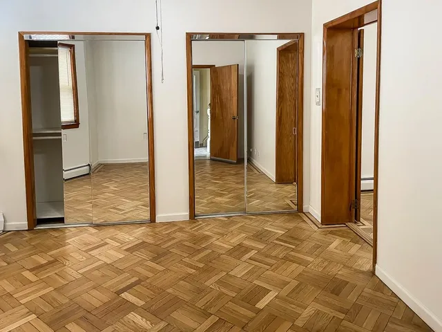 a view of a room that has a large window