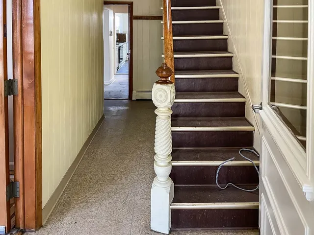 a view of a city street with cars