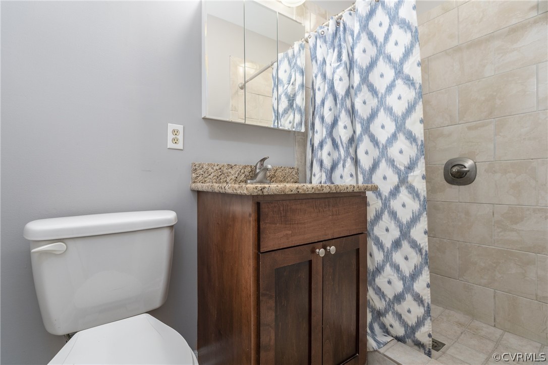 10200 Ambridge Road Chesterfield, VA 23832 - Photo 27 of 36 a bathroom with a toilet and a sink