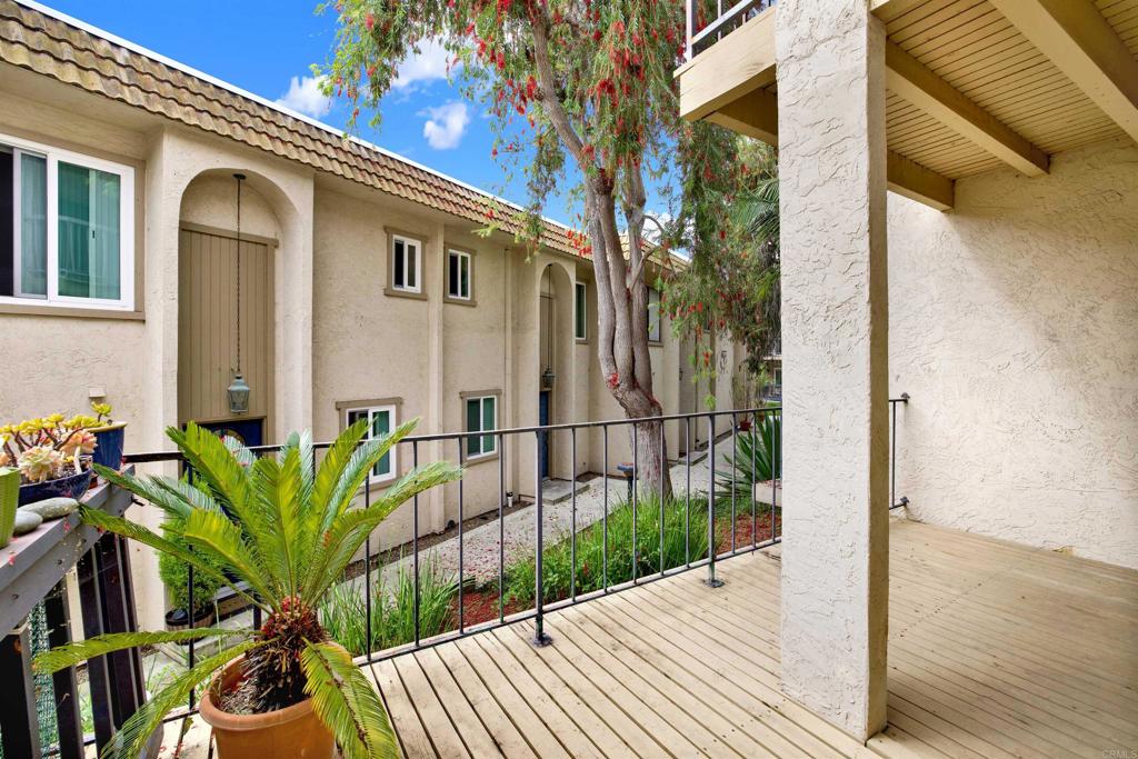 2383 Altisma Way, Unit D Carlsbad, CA 92009 - Photo 14 of 40 a view of a potted plants on a wooden floor
