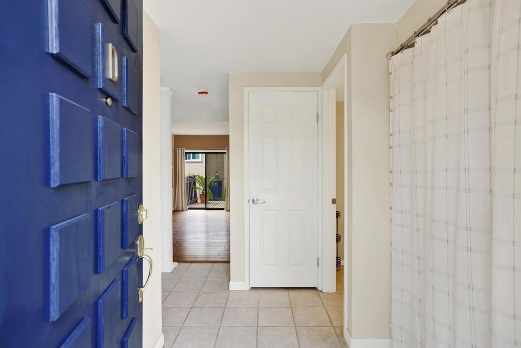 2383 Altisma Way, Unit D Carlsbad, CA 92009 - Photo 3 of 40 a view of empty room with kitchen