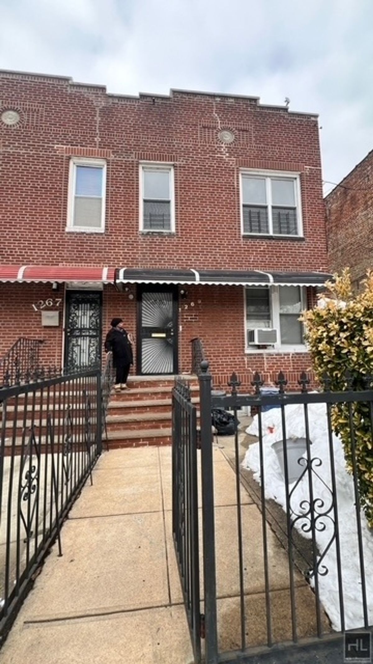 1269 Remsen Avenue, Unit 2 Brooklyn, NY 11236 - Photo 21 of 22 front view of a brick house with large windows