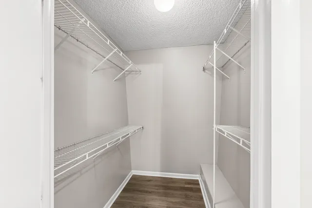 a view of an empty walk in closet