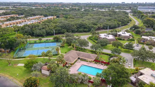 an aerial view of house with yard