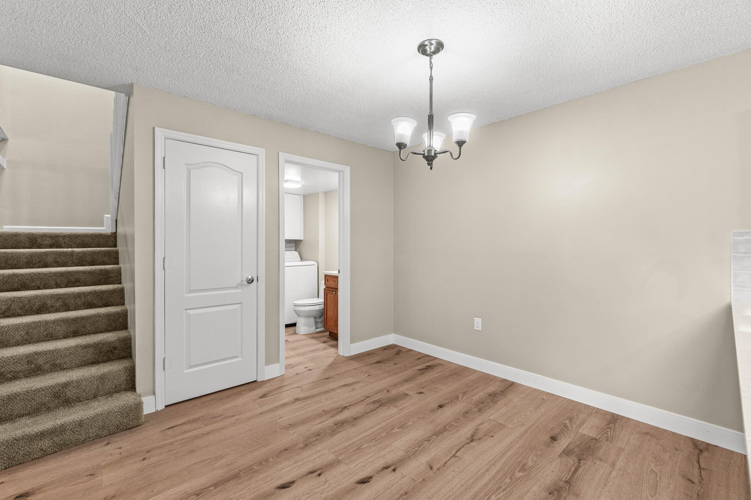 2905 Southwest 22nd Circle, Unit 40A Delray Beach, FL 33445 - Photo 7 of 38 a view of empty room with wooden floor