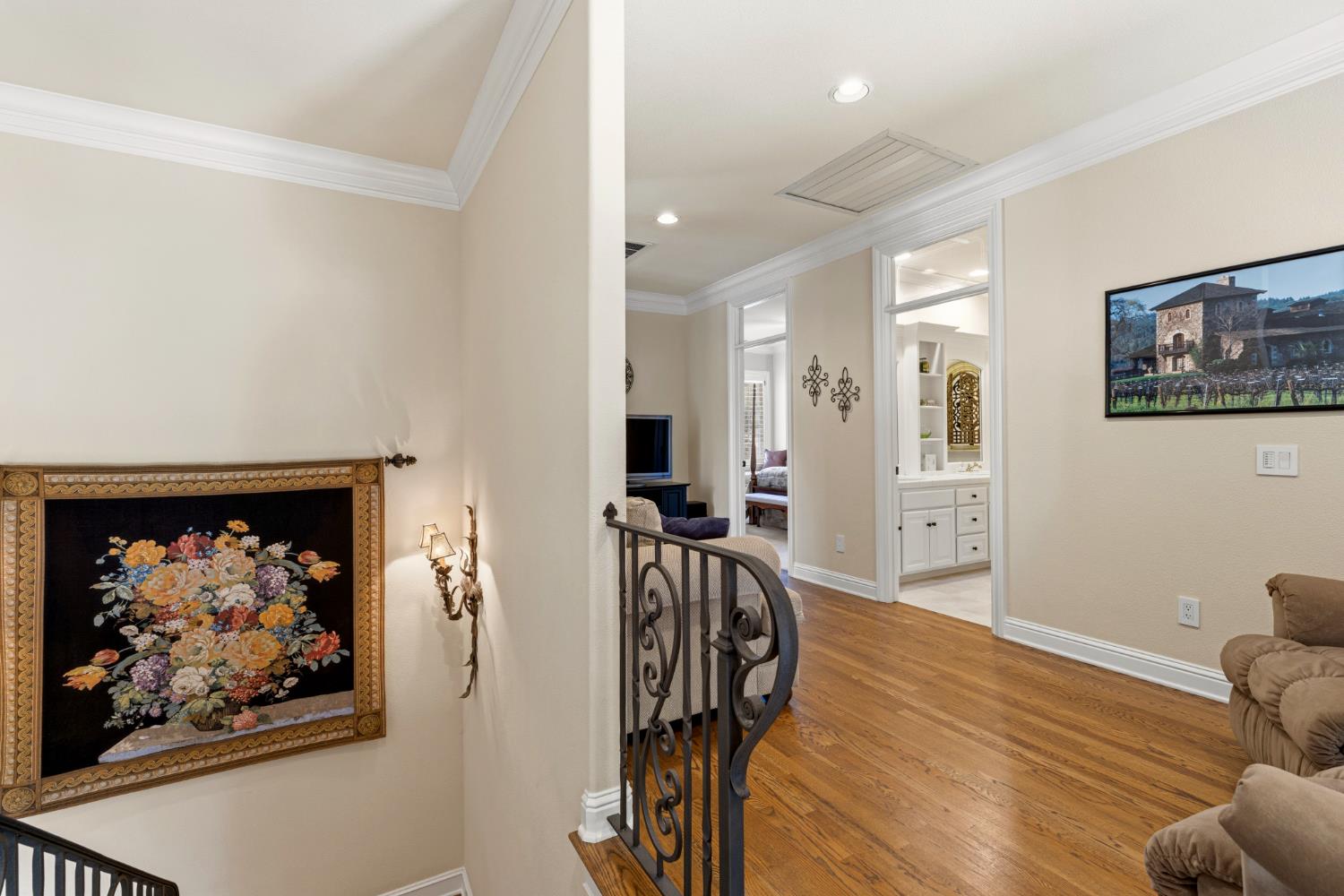 5869 Granite Hills Drive South Granite Bay, CA 95746 - Photo 38 of 66 a view of a hallway with a painting on the wall