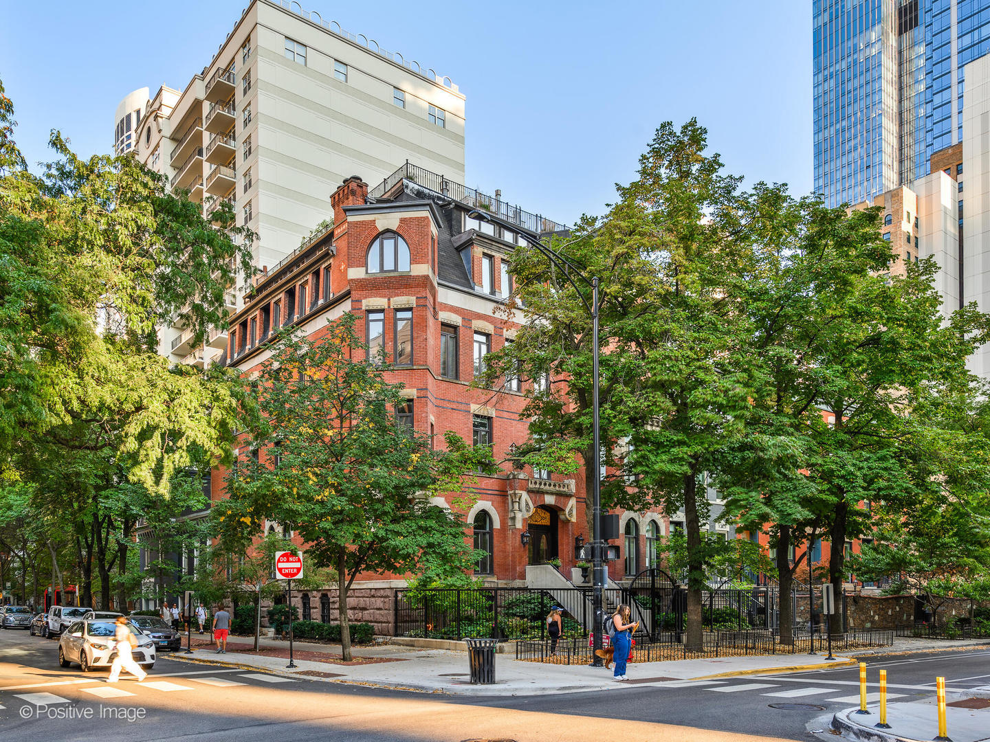 839 North Dearborn Street, Unit F Chicago, IL 60610 - Photo 1 of 40 a view of a tall building next to a road