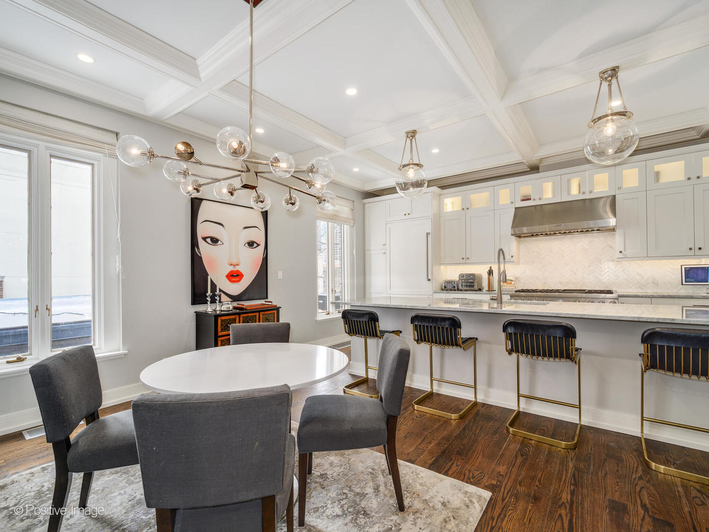 839 North Dearborn Street, Unit F Chicago, IL 60610 - Photo 12 of 40 a kitchen with granite countertop a dining table chairs stove and kitchen view