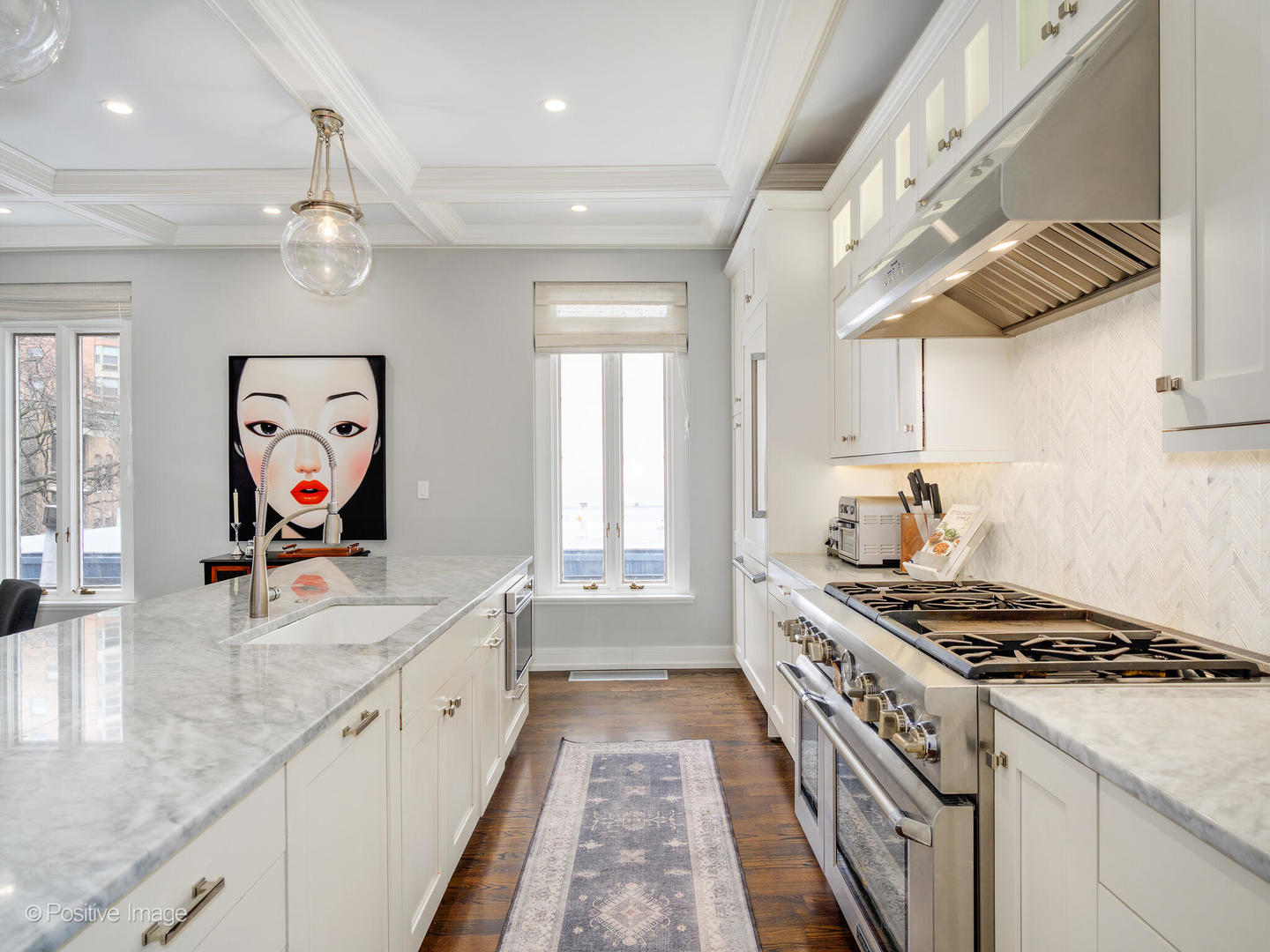 839 North Dearborn Street, Unit F Chicago, IL 60610 - Photo 13 of 40 a kitchen with stainless steel appliances granite countertop a stove a sink and a microwave