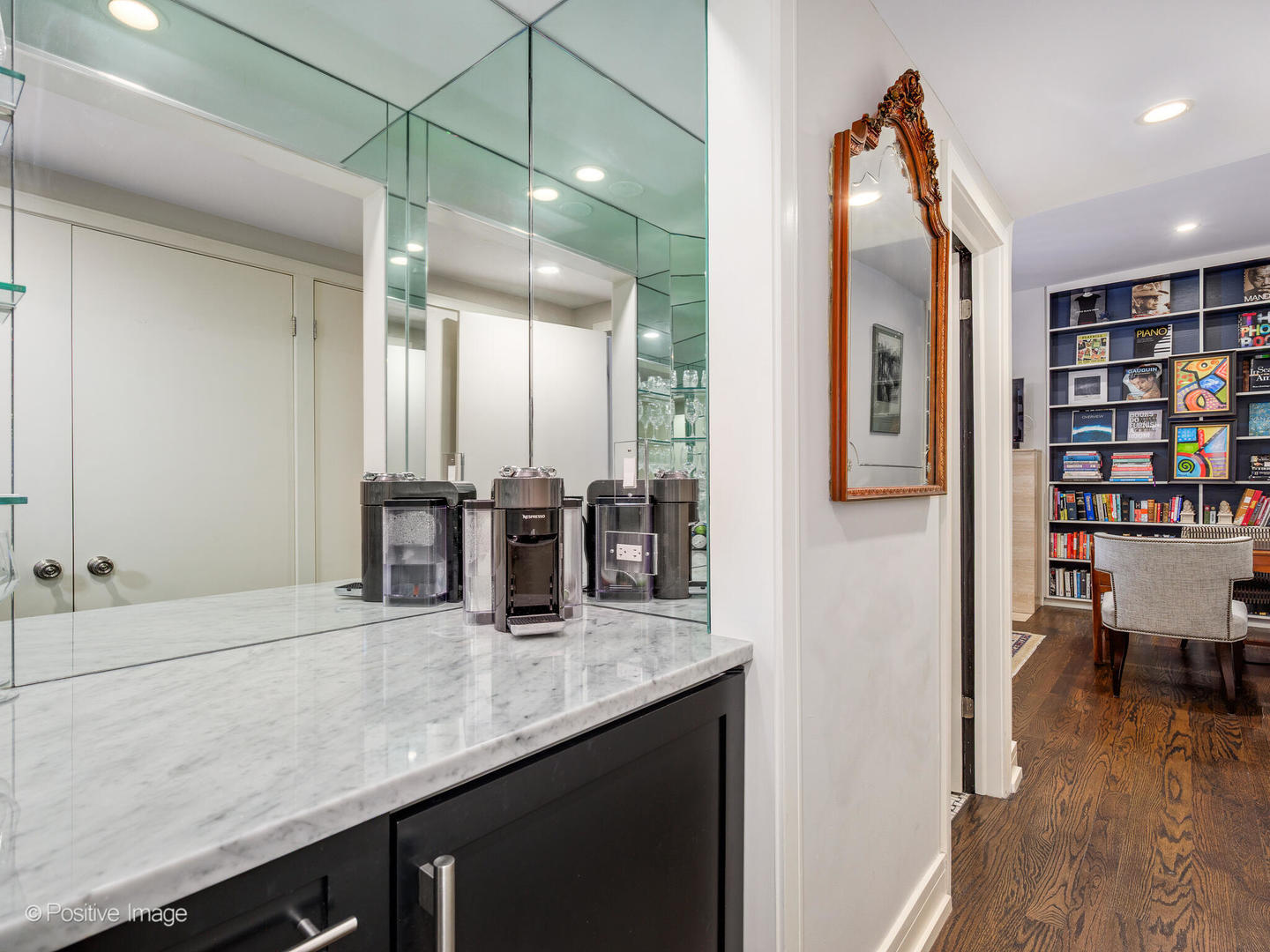 839 North Dearborn Street, Unit F Chicago, IL 60610 - Photo 18 of 40 a bathroom with a double vanity sink and a mirror