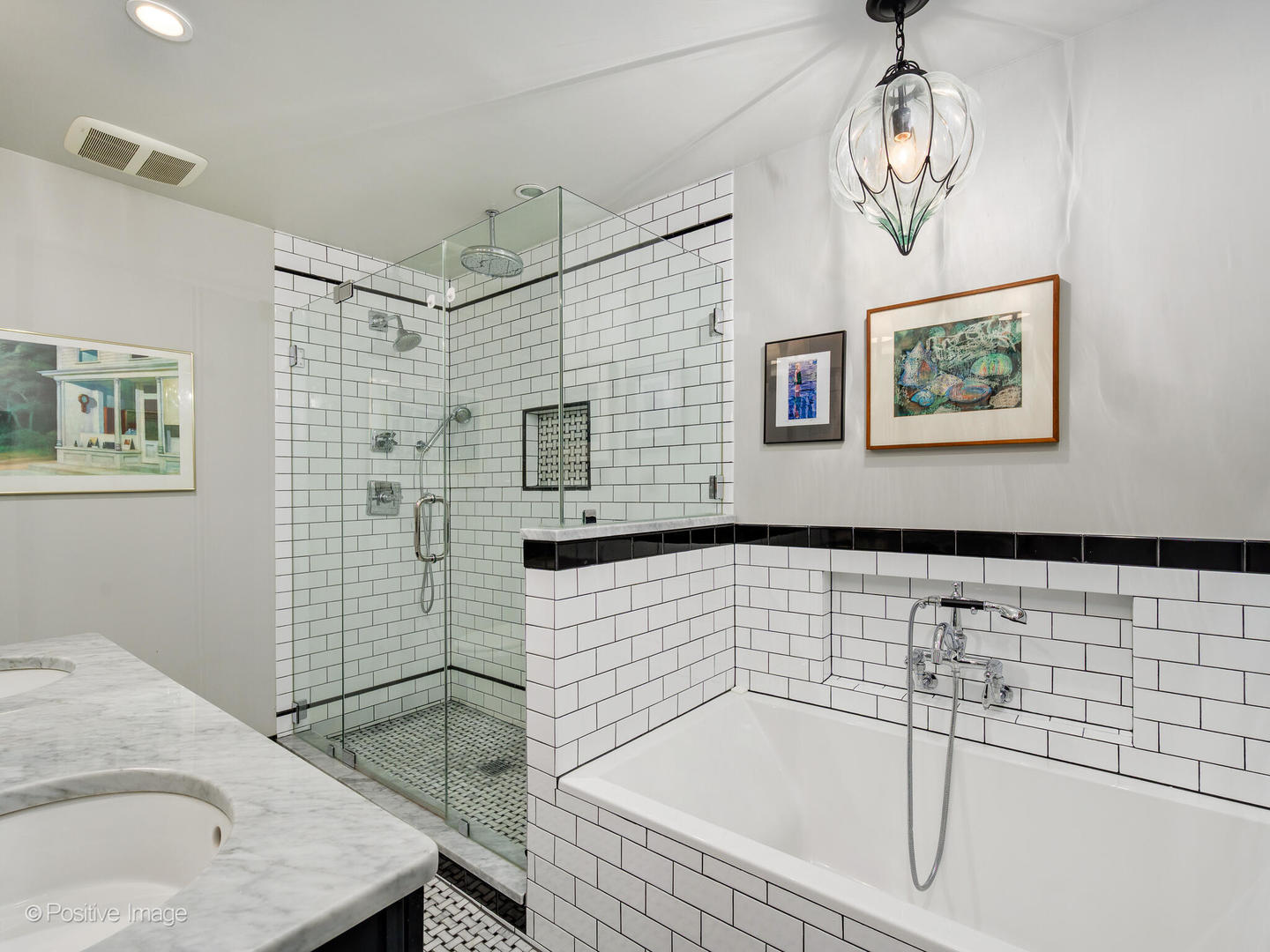 839 North Dearborn Street, Unit F Chicago, IL 60610 - Photo 20 of 40 a bathroom with a sink and a bathtub