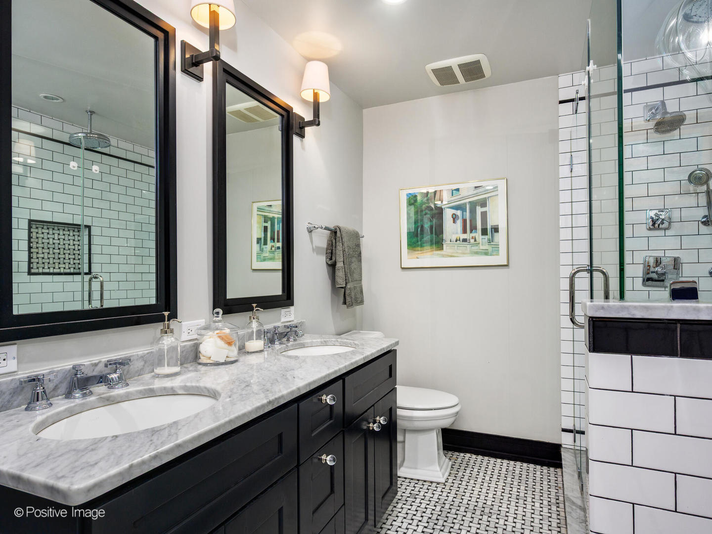 839 North Dearborn Street, Unit F Chicago, IL 60610 - Photo 21 of 40 a bathroom with a granite countertop sink a toilet a mirror and shower
