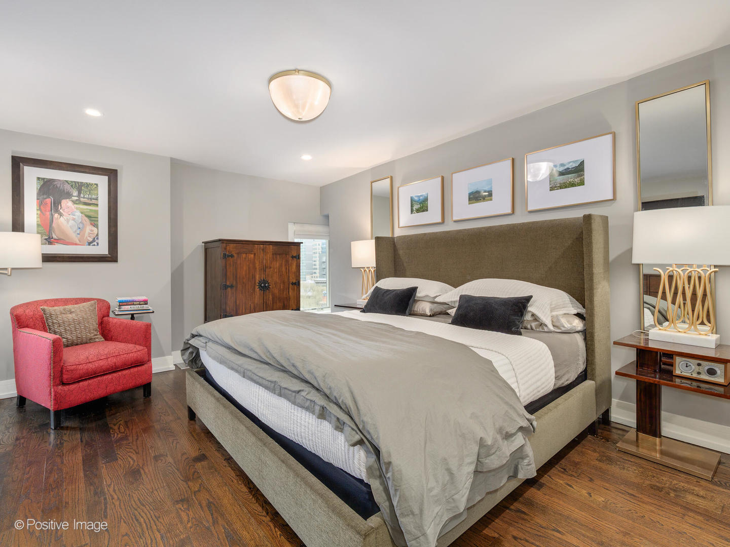 839 North Dearborn Street, Unit F Chicago, IL 60610 - Photo 22 of 40 a spacious bedroom with a bed and a couch