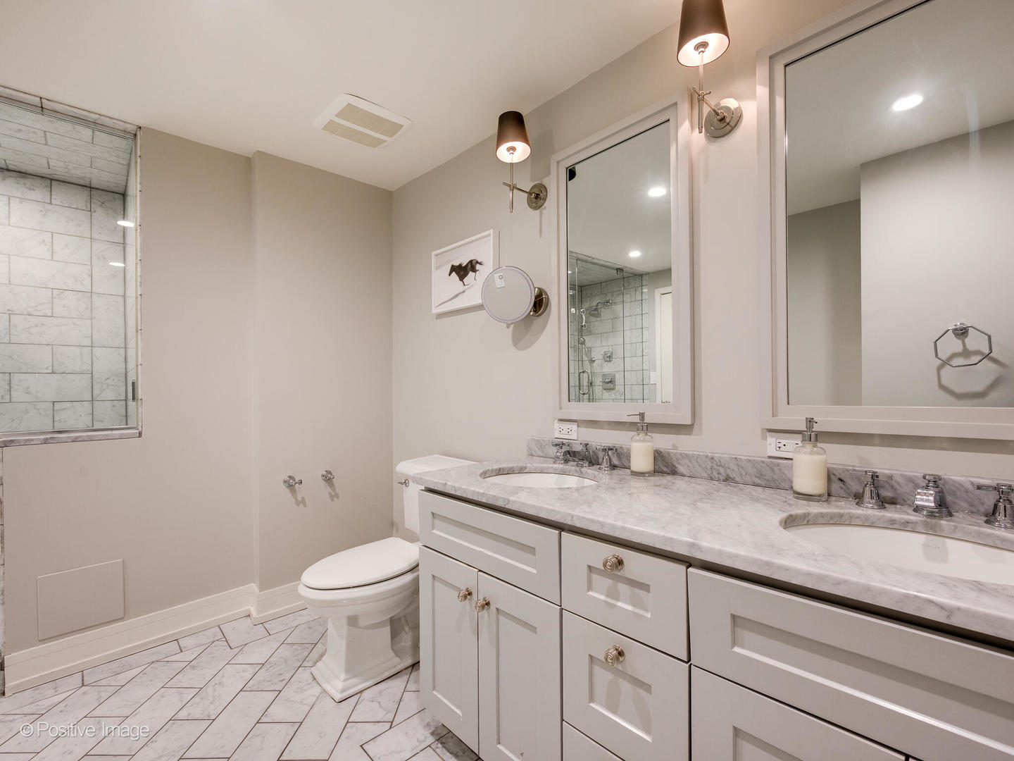 839 North Dearborn Street, Unit F Chicago, IL 60610 - Photo 25 of 40 a bathroom with a granite countertop sink a toilet and a mirror