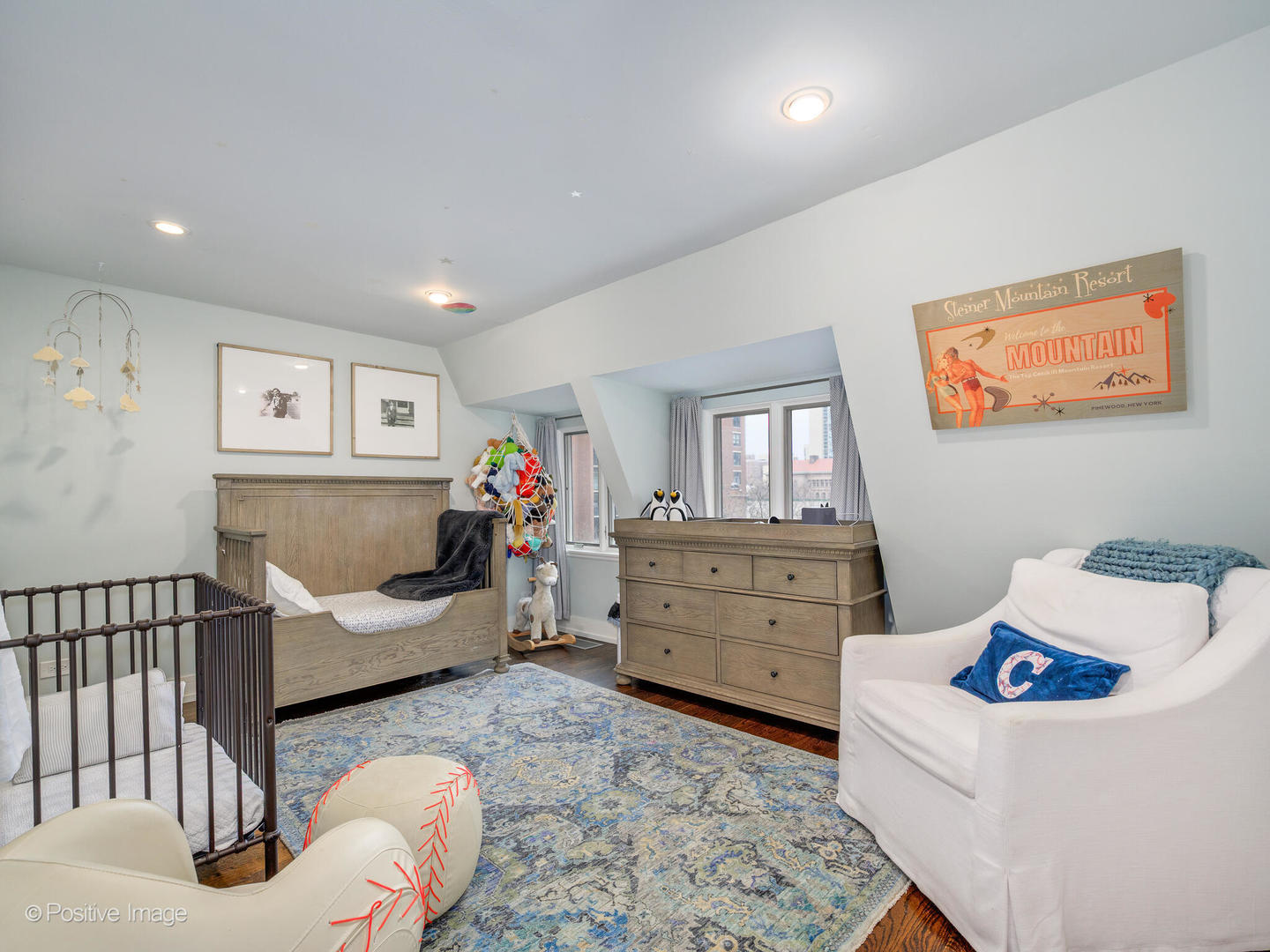 839 North Dearborn Street, Unit F Chicago, IL 60610 - Photo 26 of 40 a living room with furniture and a baby crib