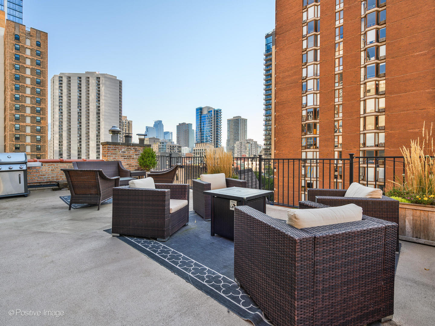 839 North Dearborn Street, Unit F Chicago, IL 60610 - Photo 30 of 40 a view of a living room with furniture and a fireplace